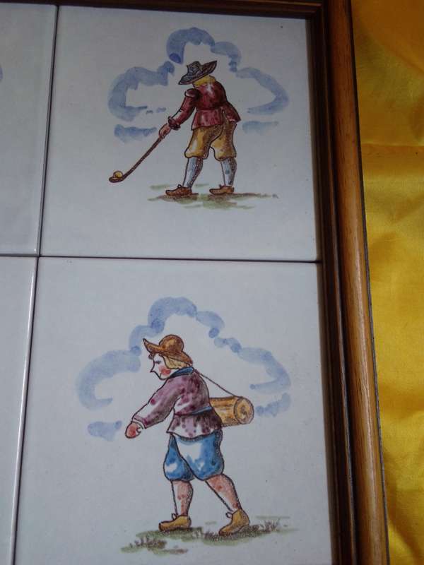 Four Vintage Framed Tiles (Depicting a 17th Century Golfer)