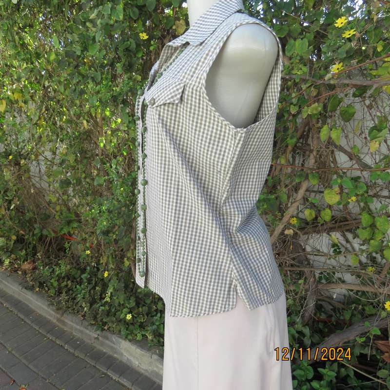 Cool olive green and cream check cotton button down/open collar top. Yoked front.Size 36.As new