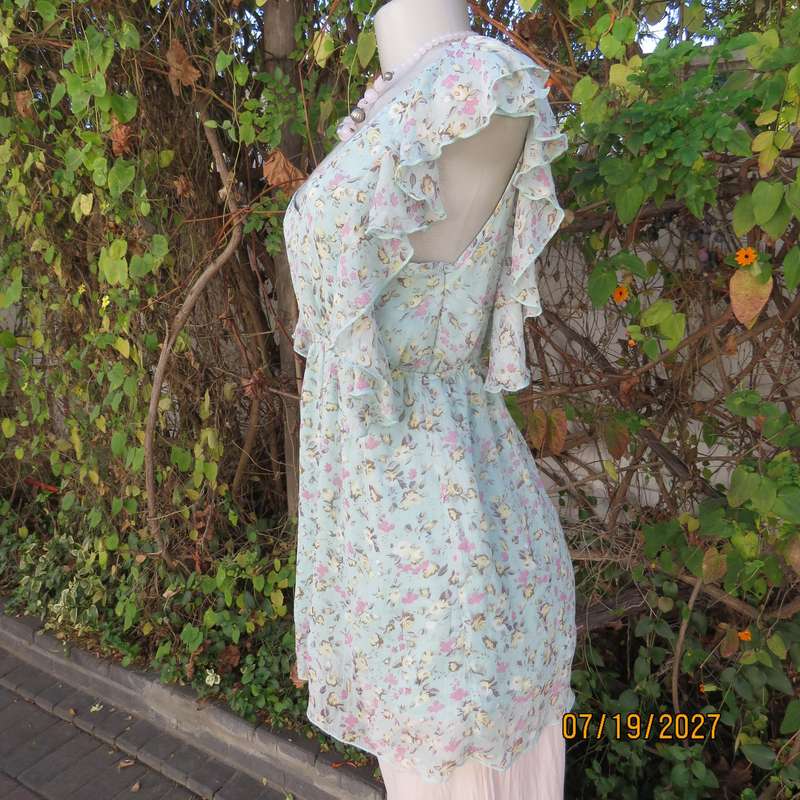 EXACT aqua empire waist lined top with tiny pink-cream floral print. Size 36.
