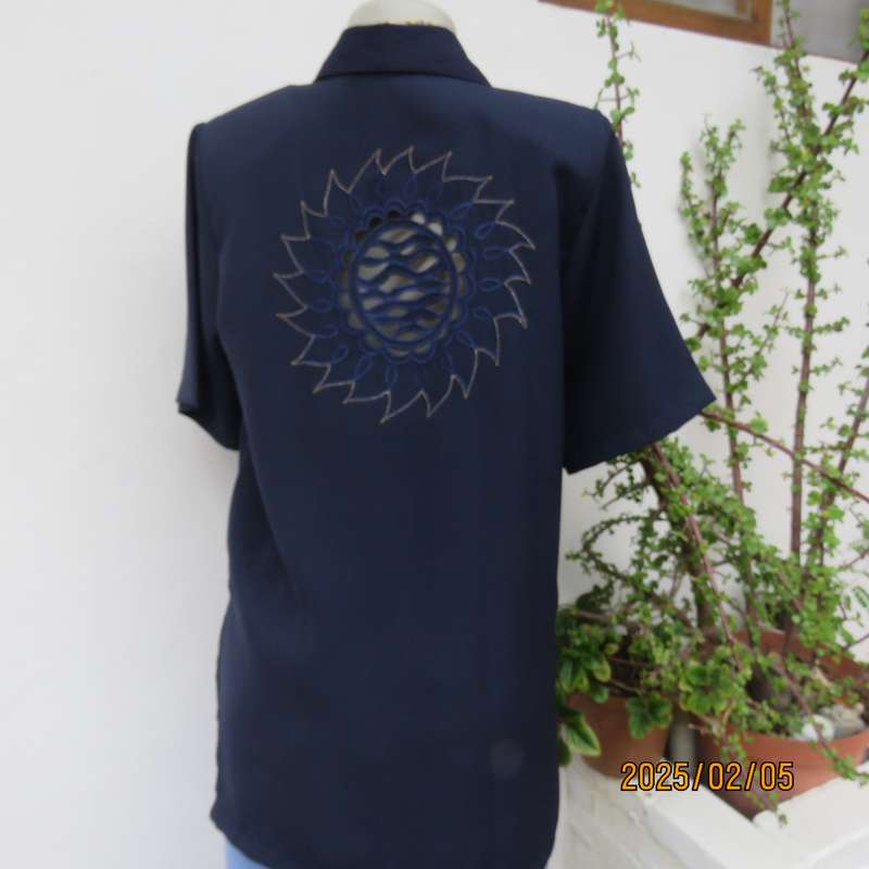 Exquisite navy short sleeve polyester richly embroidered with cut-out work-gold thread top.Size 36.