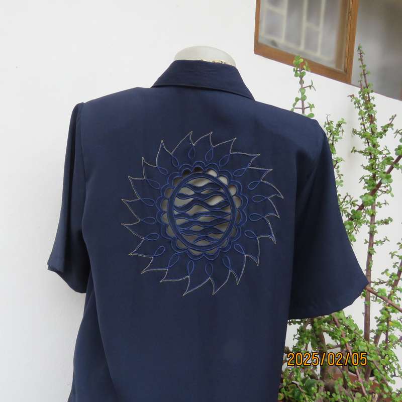 Exquisite navy short sleeve polyester richly embroidered with cut-out work-gold thread top.Size 36.