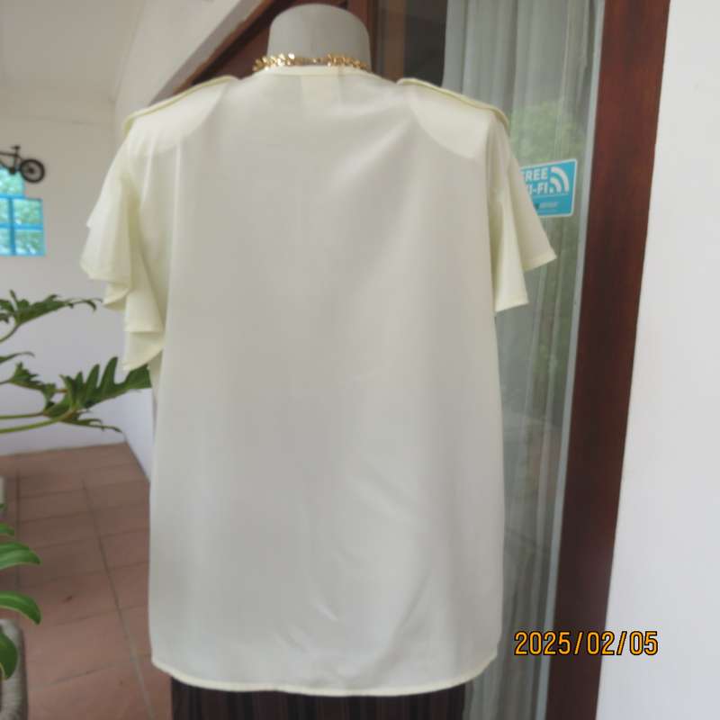 NEW DIRECTION rich cream silky polyester top. Size 42. Flare frilled armholes.Flare collar.
