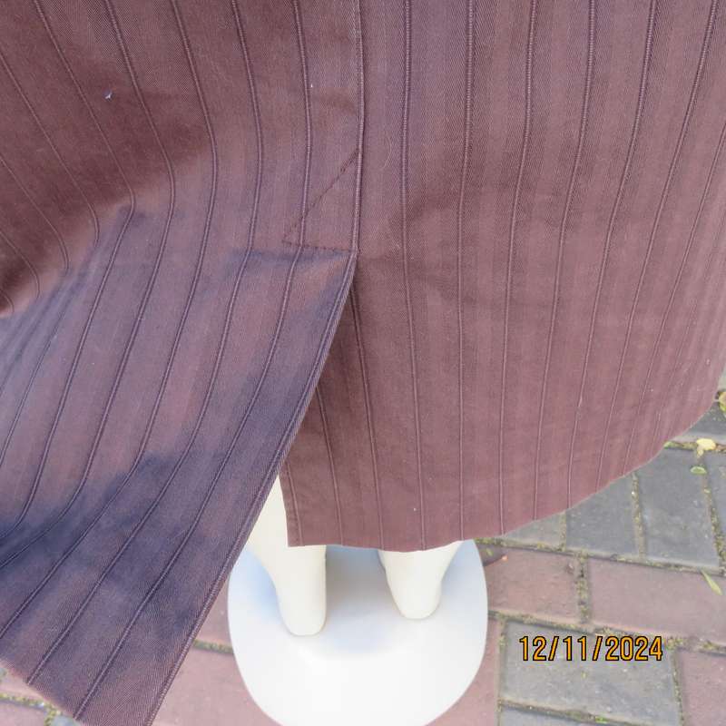 Dark brown striped firm textured stretch polyester pencil lined skirt.Size 38.Zip/pleat at back.