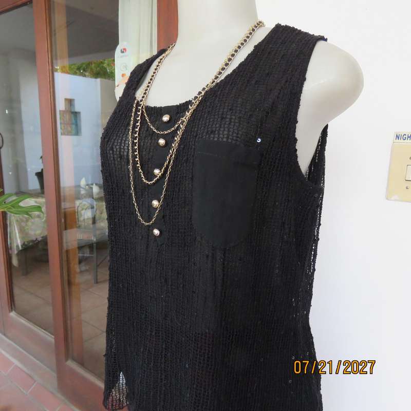 Black sleeveless 2 layer top size 36 with top layer in textured stretch sequined mesh.