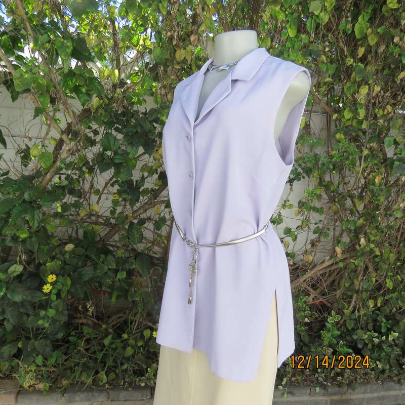 Elegant sleeveless lilac long 100% polyester jacket. Button down/open collar. Size 38 FOSHINI.New co