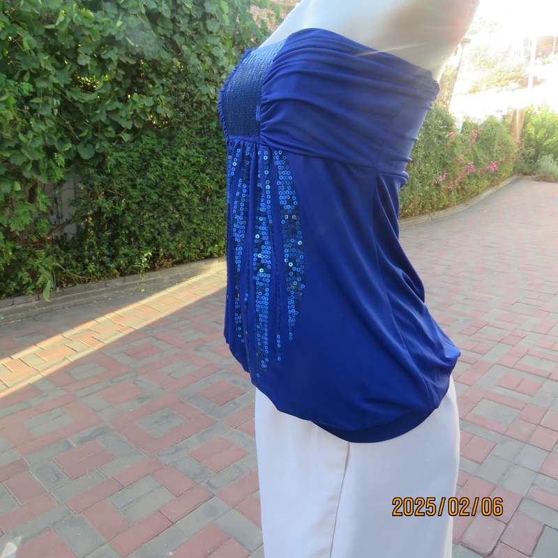 Luxury strapless evening top in royal blue stretch polyester. Sequin decorated. Size 34. As new.