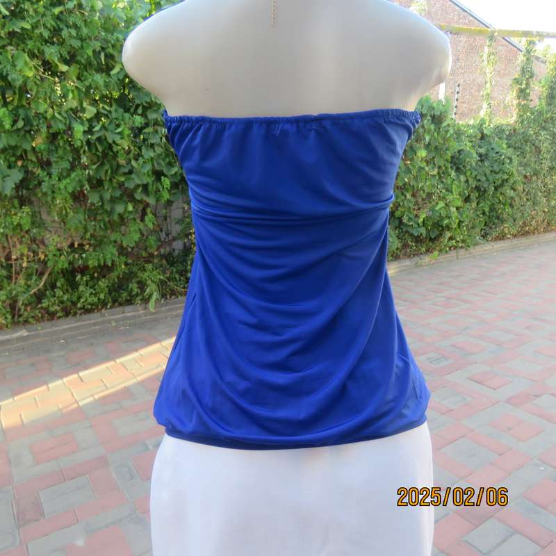 Luxury strapless evening top in royal blue stretch polyester. Sequin decorated. Size 34. As new.