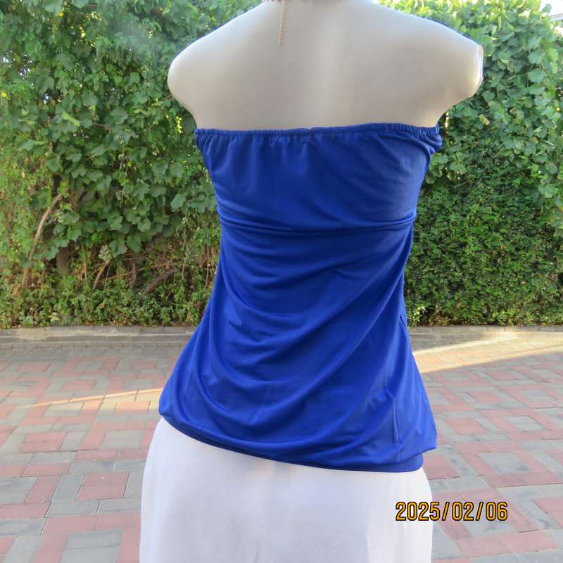 Luxury strapless evening top in royal blue stretch polyester. Sequin decorated. Size 34. As new.