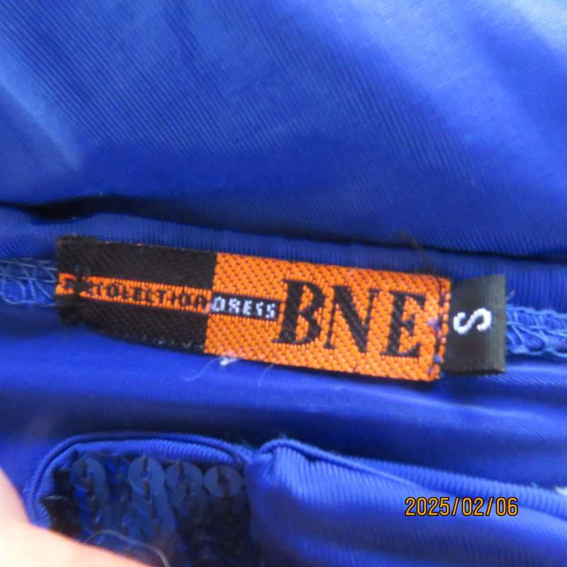 Luxury strapless evening top in royal blue stretch polyester. Sequin decorated. Size 34. As new.