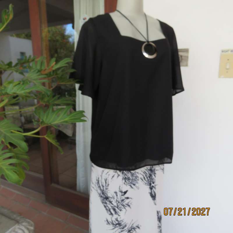 Black smart bell sleeve 2 layer sheer polyester square neck top. Size 40.