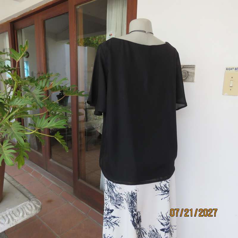 Black smart bell sleeve 2 layer sheer polyester square neck top. Size 40.