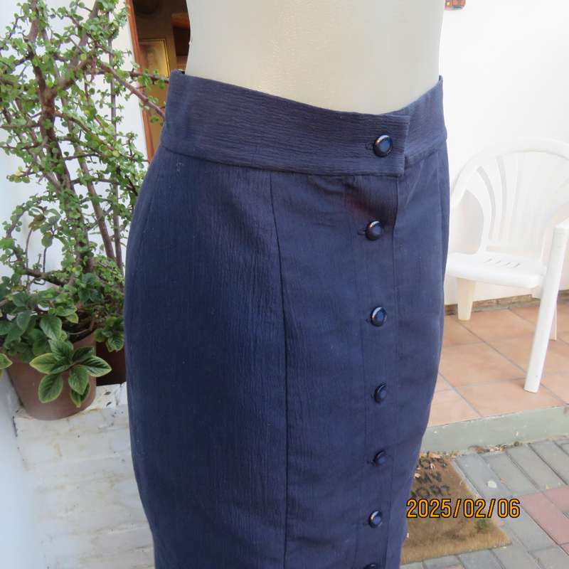 Button down navy slightly creased polycotton lined ankle length skirt. Size 38. As new cond.