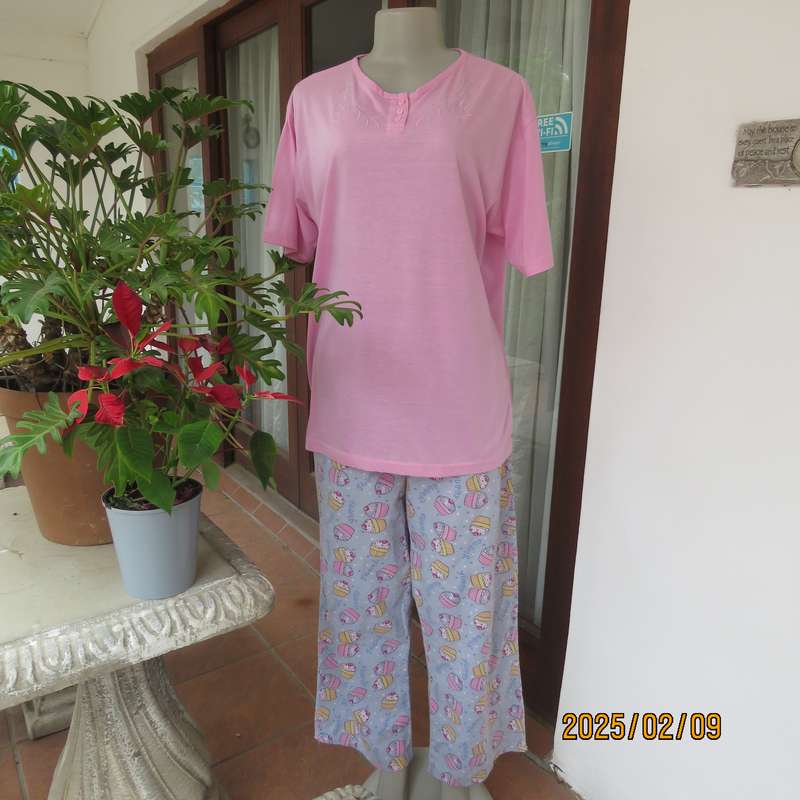 Rose pink pajama top by MILLION DREAMS size 40. Short sleeves. Short button down opening.