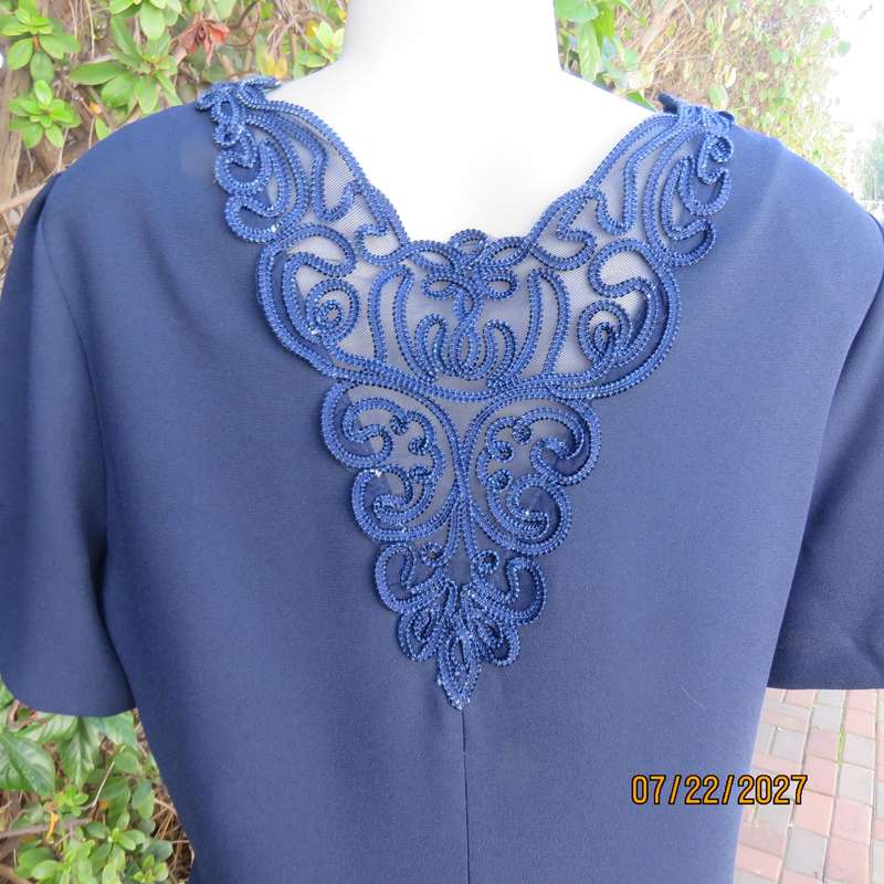 DELSWA GOLD elegant extra long navy 6 button down jacket. Pleated back-corded decoration. Size 40