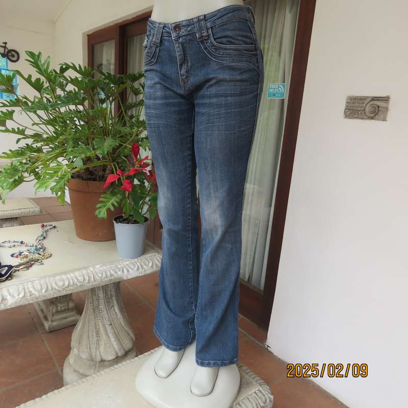 Sexy high quality blue denim stretch polycotton bootcut jeans. Size 32-34. With 5 pockets. As new