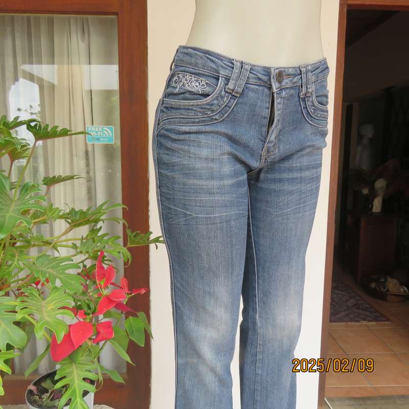 Sexy high quality blue denim stretch polycotton bootcut jeans. Size 32-34. With 5 pockets. As new