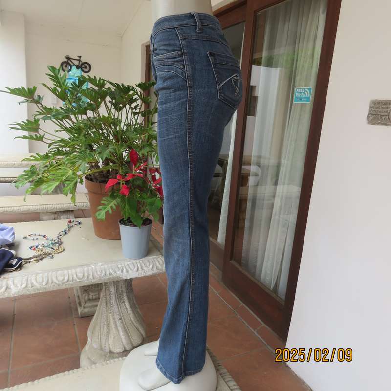 Sexy high quality blue denim stretch polycotton bootcut jeans. Size 32-34. With 5 pockets. As new