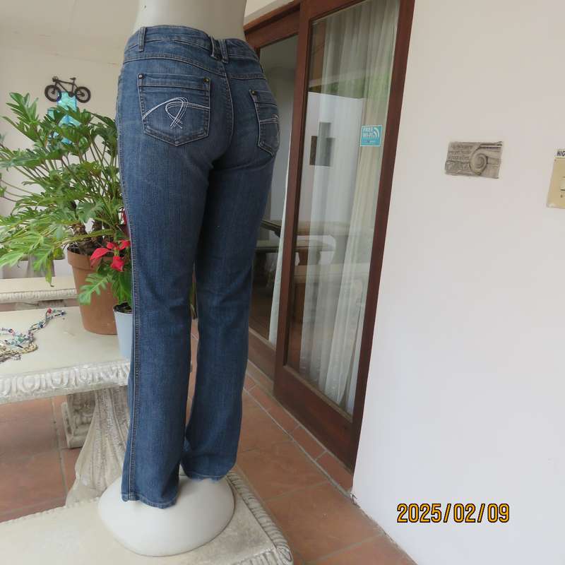 Sexy high quality blue denim stretch polycotton bootcut jeans. Size 32-34. With 5 pockets. As new