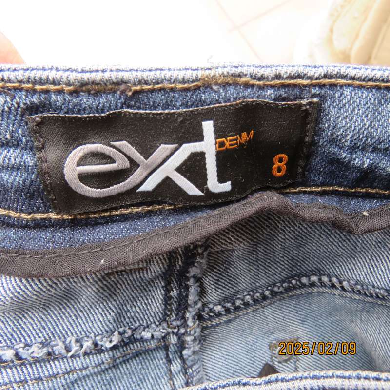 Sexy high quality blue denim stretch polycotton bootcut jeans. Size 32-34. With 5 pockets. As new