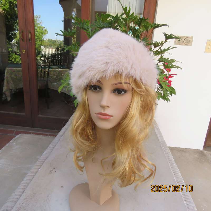 Soft cream faux fur urban style warm hat with some stretch. Warm for winter. New item.