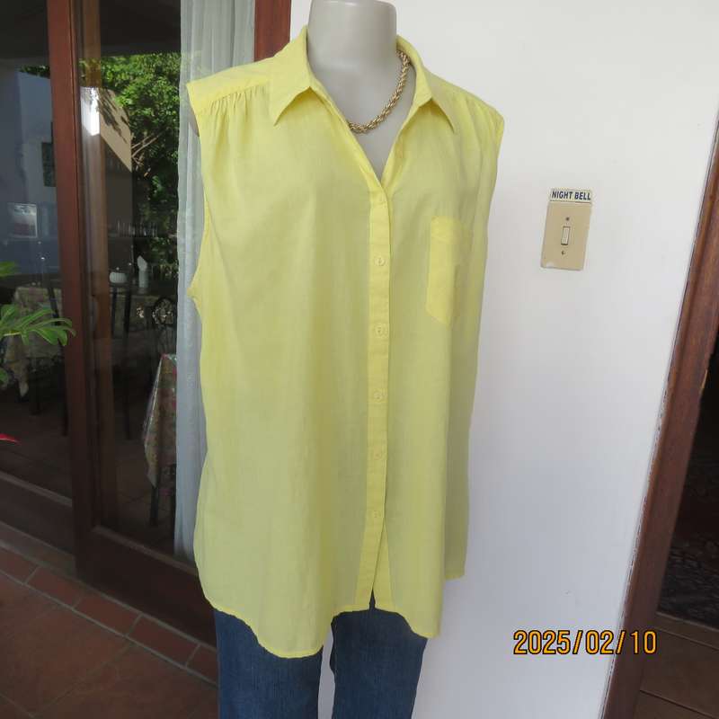 Buttercup yellow sleeveless top with V open collar. Gathered yoked. Fine cotton. Size 46.As new.