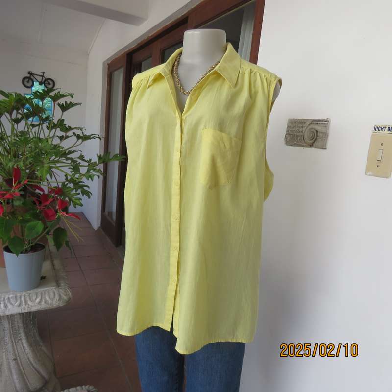 Buttercup yellow sleeveless top with V open collar. Gathered yoked. Fine cotton. Size 46.As new.