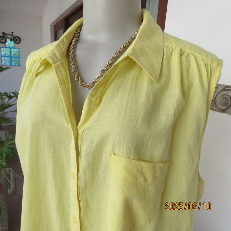Buttercup yellow sleeveless top with V open collar. Gathered yoked. Fine cotton. Size 46.As new.