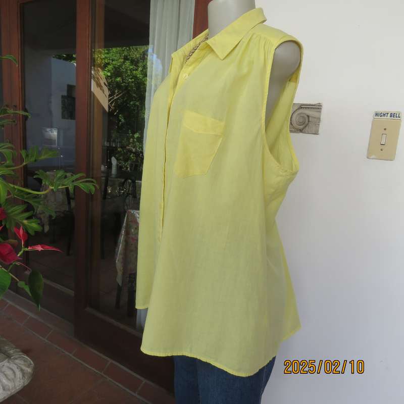 Buttercup yellow sleeveless top with V open collar. Gathered yoked. Fine cotton. Size 46.As new.