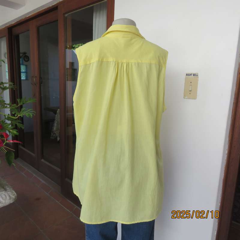 Buttercup yellow sleeveless top with V open collar. Gathered yoked. Fine cotton. Size 46.As new.