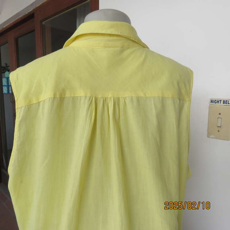 Buttercup yellow sleeveless top with V open collar. Gathered yoked. Fine cotton. Size 46.As new.