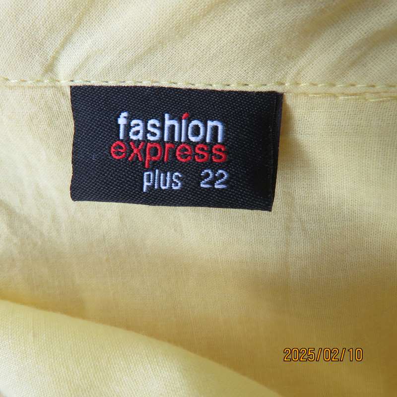 Buttercup yellow sleeveless top with V open collar. Gathered yoked. Fine cotton. Size 46.As new.