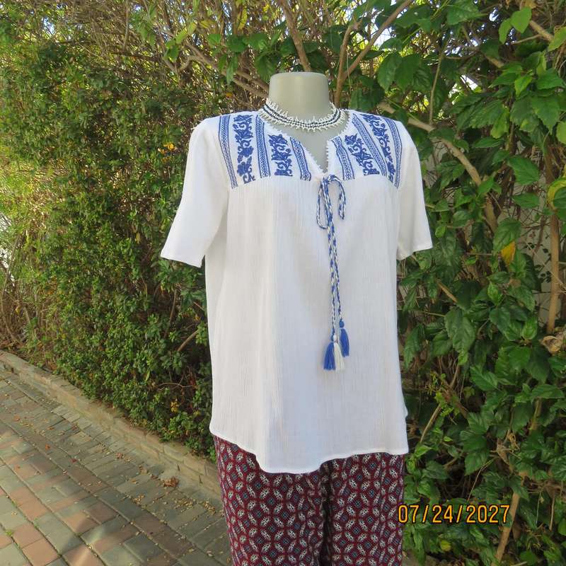 White creased cotton slip over short sleeve top. Blue embroidered front yoke. Size 36