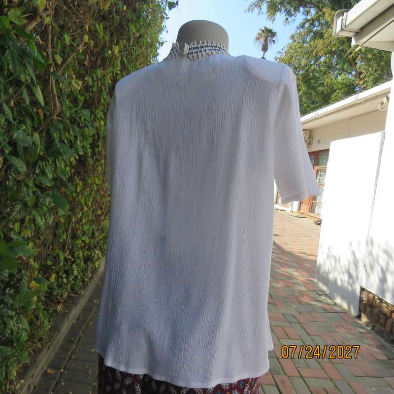 White creased cotton slip over short sleeve top. Blue embroidered front yoke. Size 36