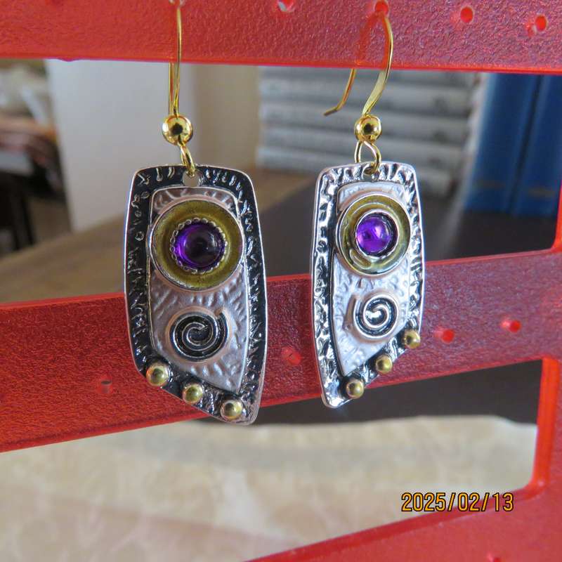 Creative alloy and resin earrings with little purple stones. New item.