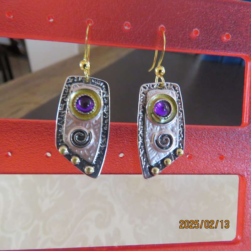 Creative alloy and resin earrings with little purple stones. New item.