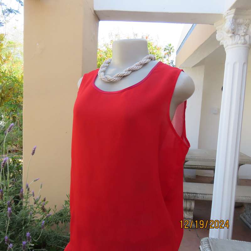 Boutique made cherry red sheer polyester sleeveless top. Satin edging around neckline.Size 38.As new