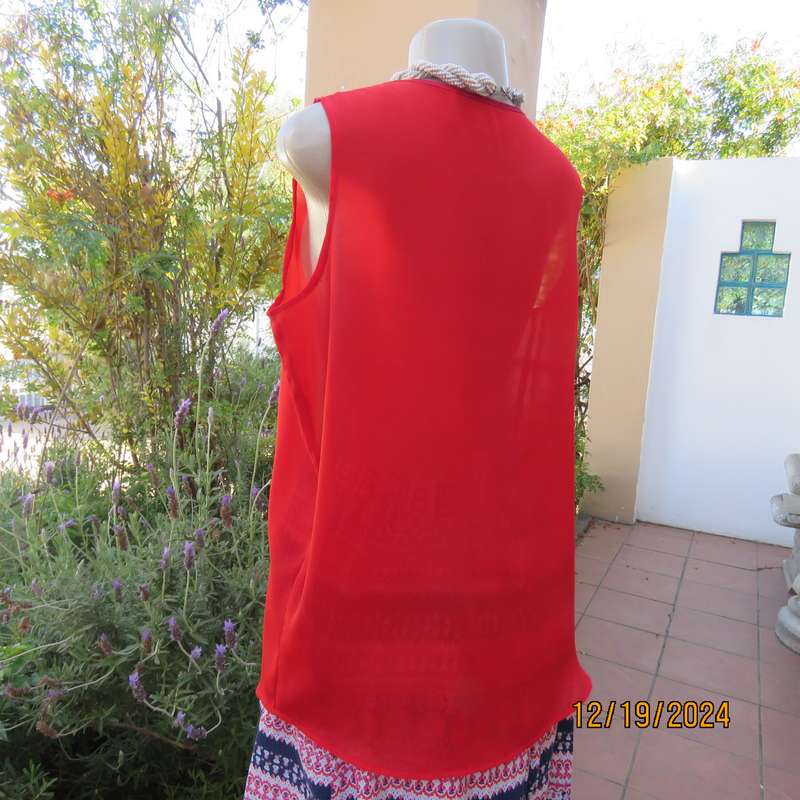 Boutique made cherry red sheer polyester sleeveless top. Satin edging around neckline.Size 38.As new