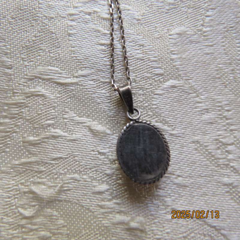 Beautiful 925 silver pendant and chain with marking. Can be faux ivory stone. As new