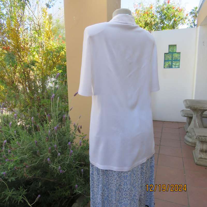 Charming cool white viscose fold over top/jacket closing with 1 button and loop.By GEORGE R size 38