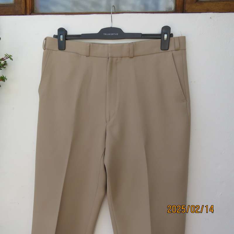 BRONZINI men's rich cream textured 100% polyester pants. Size 36. Size and 1 back pocket. As new