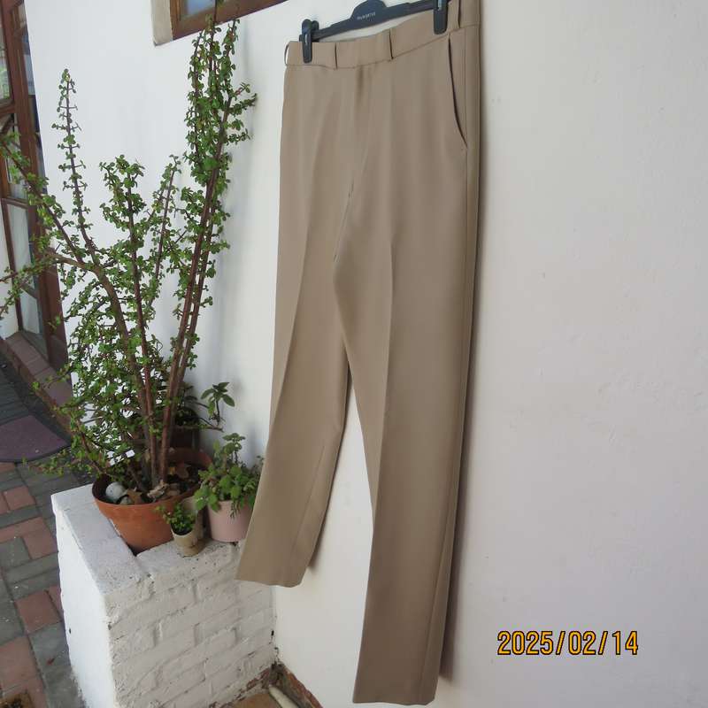 BRONZINI men's rich cream textured 100% polyester pants. Size 36. Size and 1 back pocket. As new
