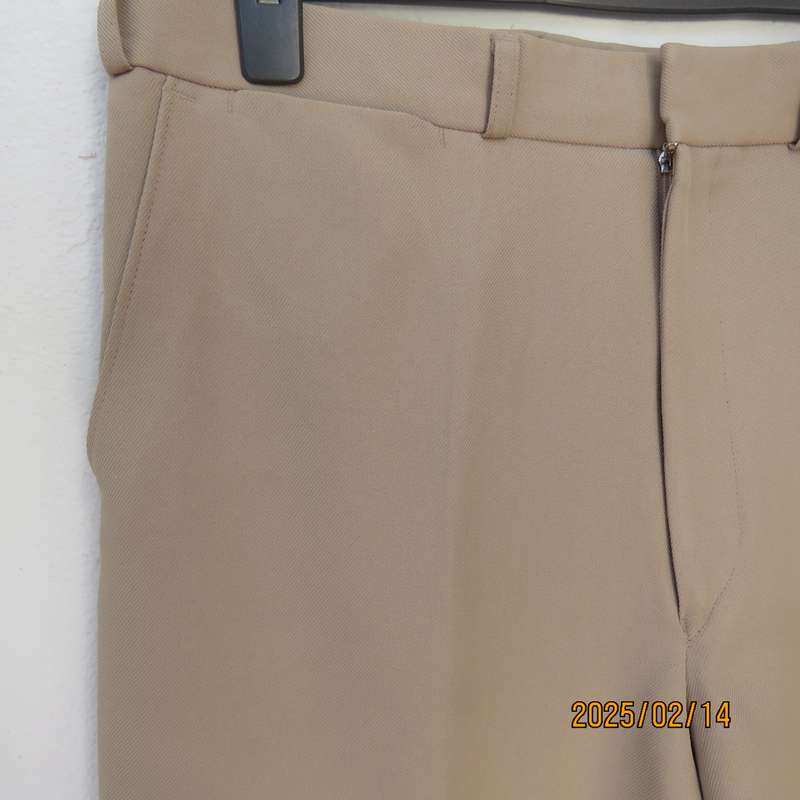 BRONZINI men's rich cream textured 100% polyester pants. Size 36. Size and 1 back pocket. As new