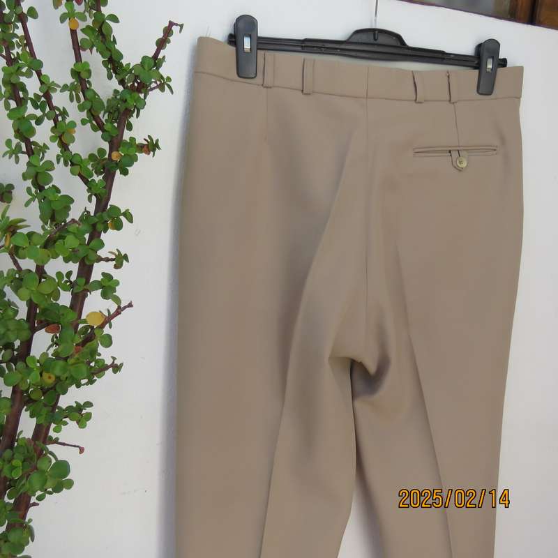 BRONZINI men's rich cream textured 100% polyester pants. Size 36. Size and 1 back pocket. As new