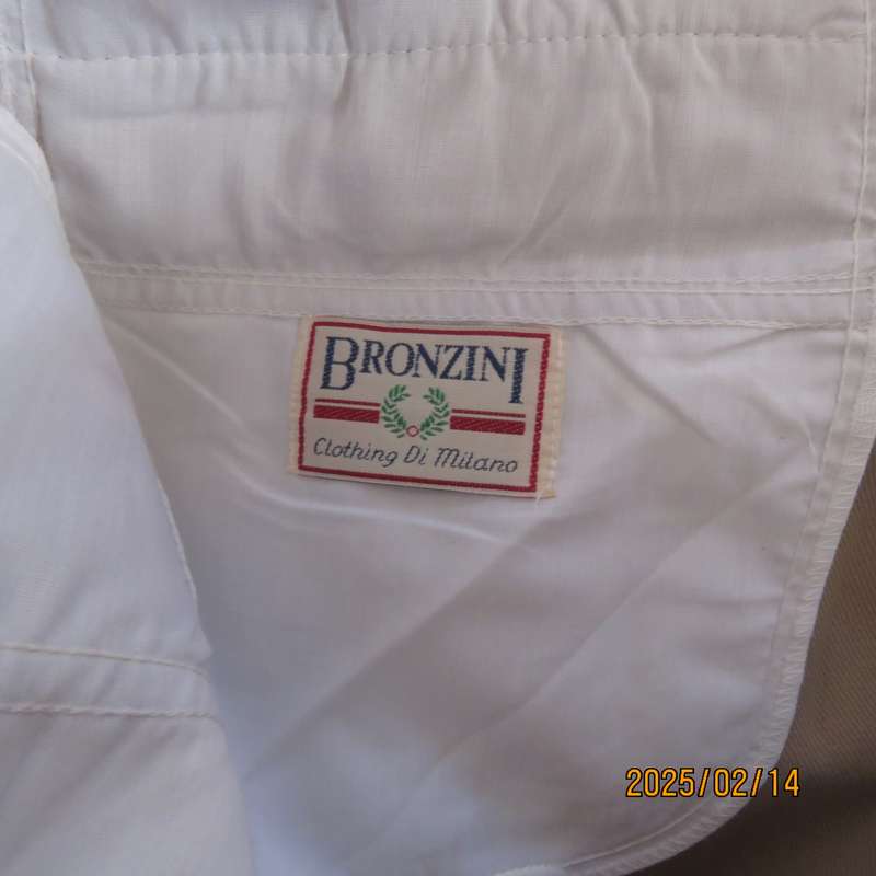 BRONZINI men's rich cream textured 100% polyester pants. Size 36. Size and 1 back pocket. As new