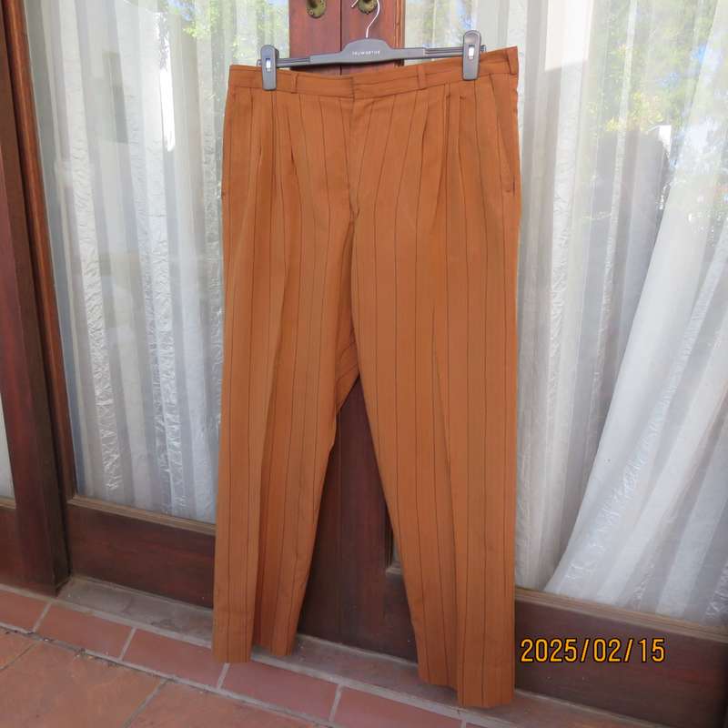 HUGO MARTELLI vintage rust colour men's pants with brown vertical stripes. Size 38. Still as new.