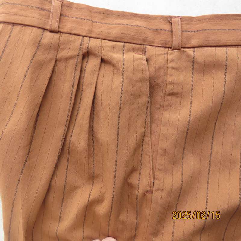 HUGO MARTELLI vintage rust colour men's pants with brown vertical stripes. Size 38. Still as new.