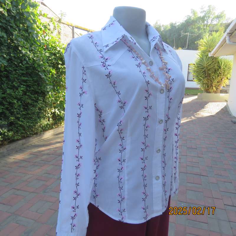 High quality KELSO 100% white long sleeve tailored top with rich pink floral line embroidery.Size 34