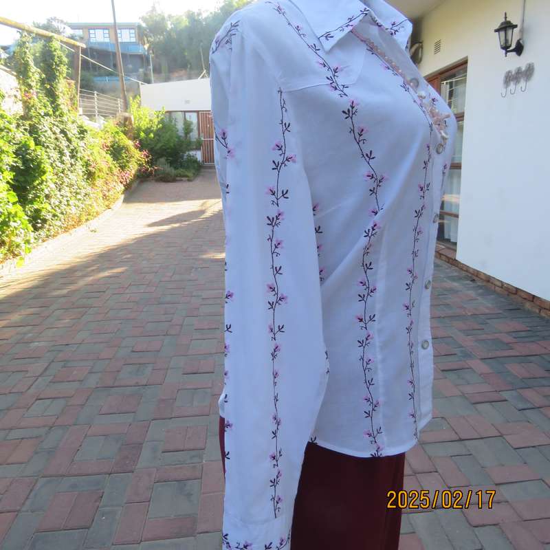 High quality KELSO 100% white long sleeve tailored top with rich pink floral line embroidery.Size 34