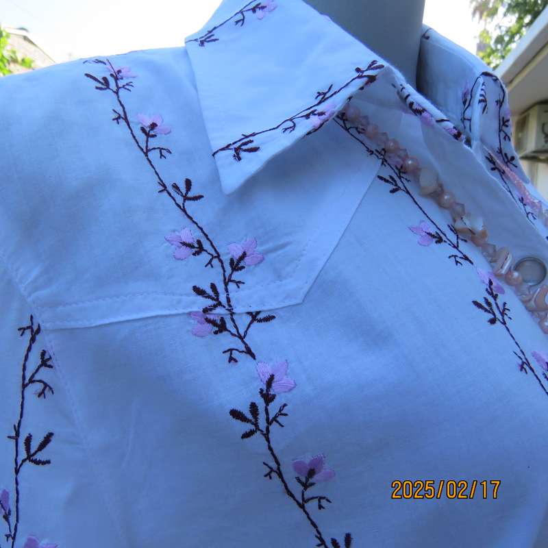 High quality KELSO 100% white long sleeve tailored top with rich pink floral line embroidery.Size 34