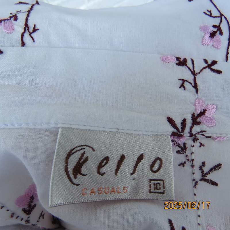 High quality KELSO 100% white long sleeve tailored top with rich pink floral line embroidery.Size 34